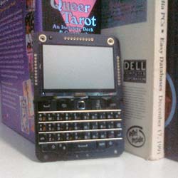 A cyberdeck device that resembles a BlackBerry